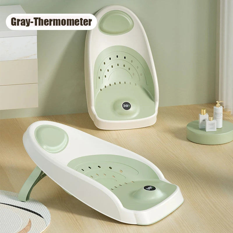 Transat de bain bébé vert avec thermomètre intégré